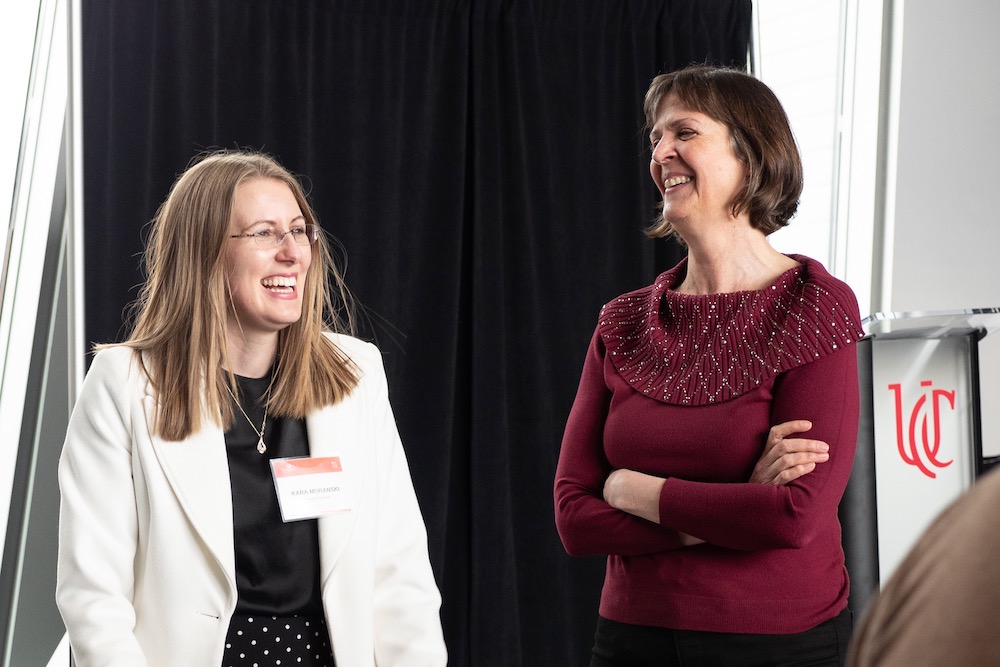 Assistant Professor Kara Moranski and Interim Dean of the College of Arts and Sciences Margaret Hanson chat before the awards ceremony. Moranski was an award winner. Photo/Margot Harknett