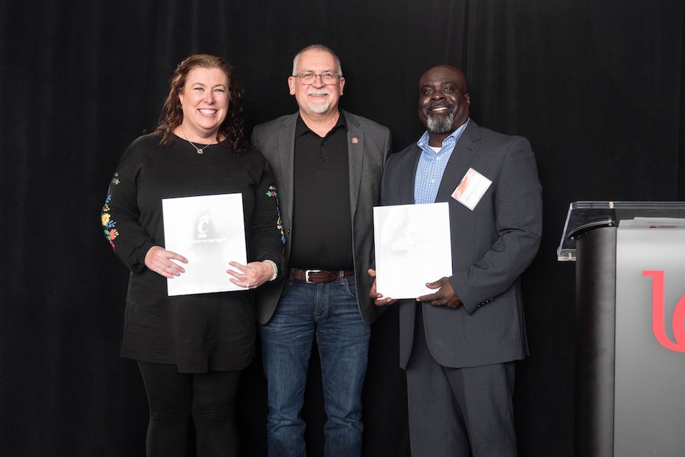 Vice President for Research Pat Limbach (middle) poses for a photo with the two College of Arts & Sciences Deans’ Faculty Excellence awardees. Photo/Margot Harknett